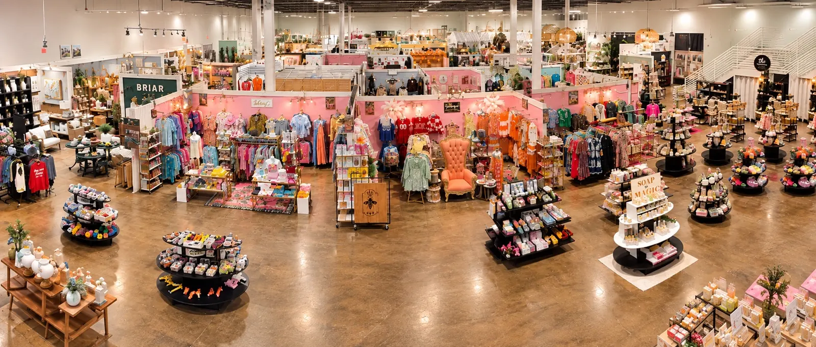 Overhead view of a Collective Boutiques store: rows of shop-owner boutiques and freestanding displays under one roof