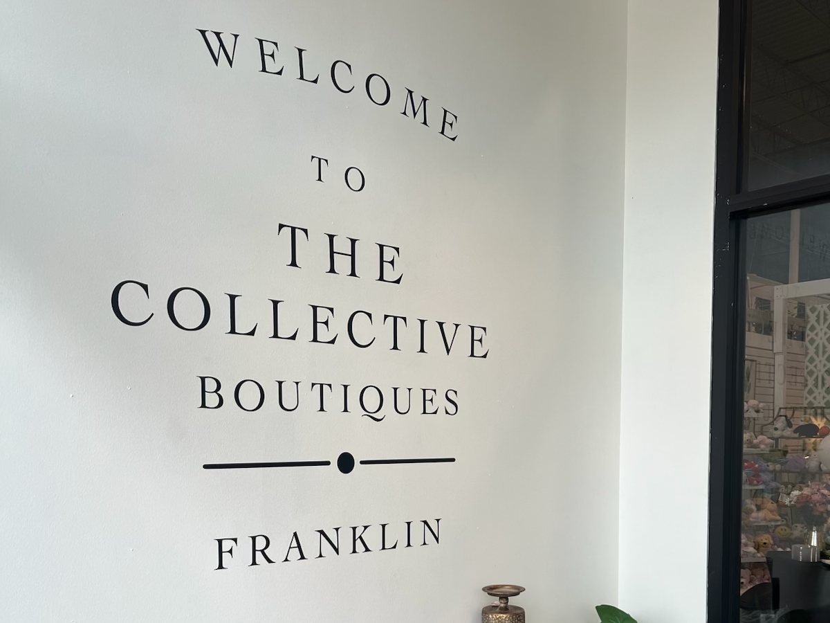 The entrance wall at The Collective Boutiques in Franklin, a multi-vendor boutique store running Syncrostore