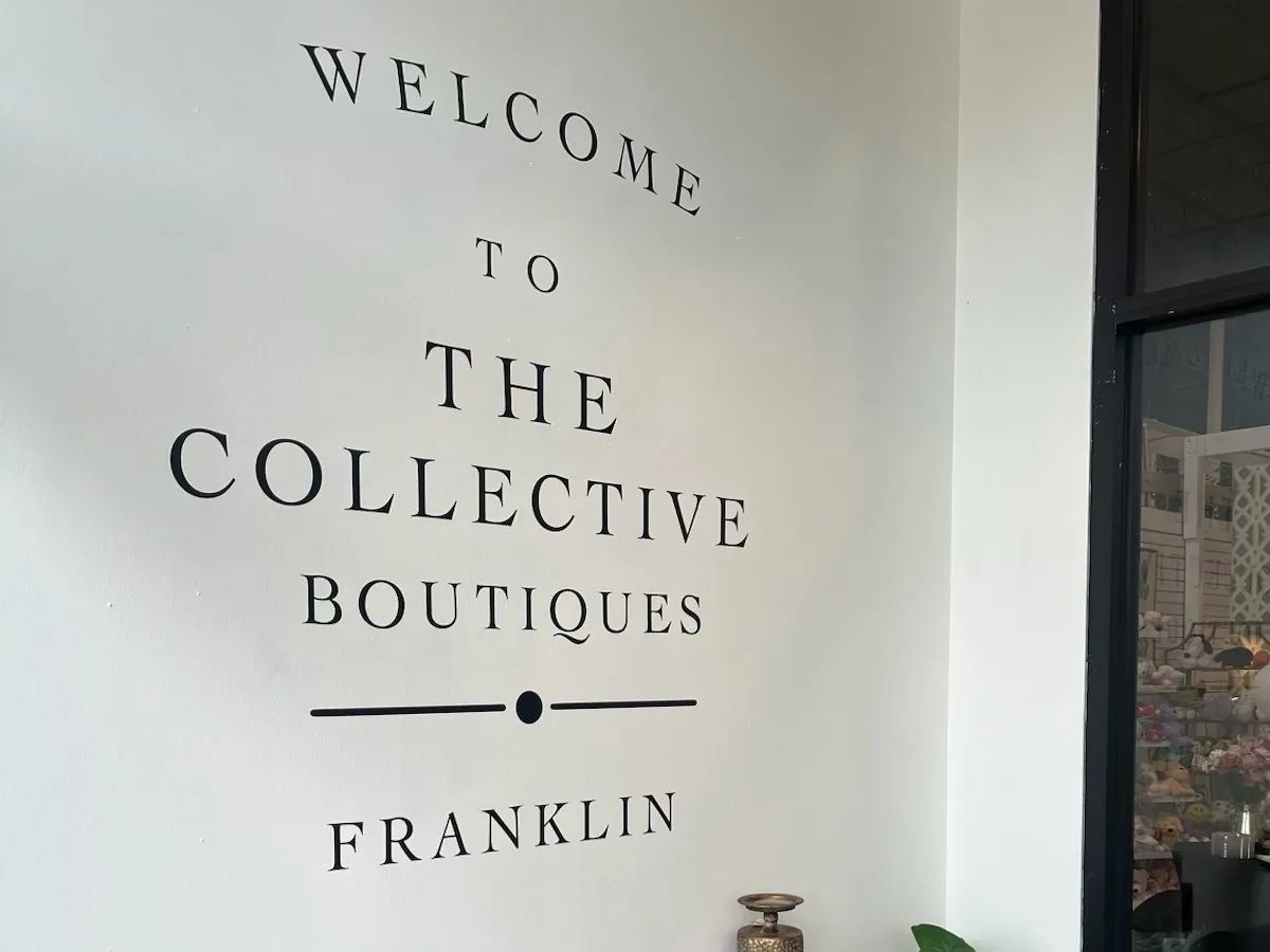 The entrance wall at The Collective Boutiques in Franklin, a multi-vendor boutique store running Syncrostore